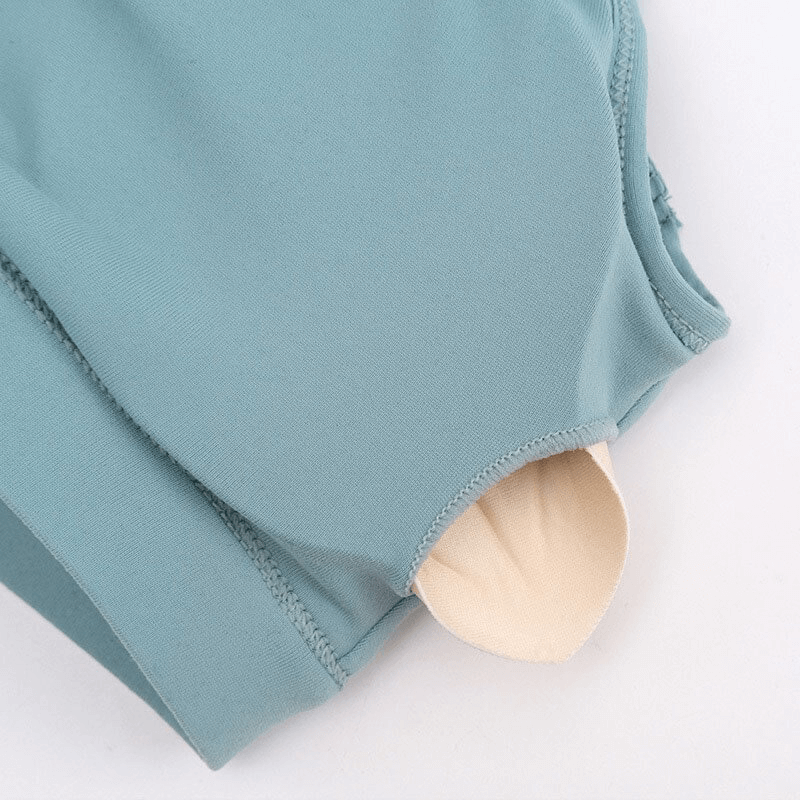 Close-up of athletic women's sports bra with soft, breathable fabric and removable padding for yoga and fitness. Model SF0974.